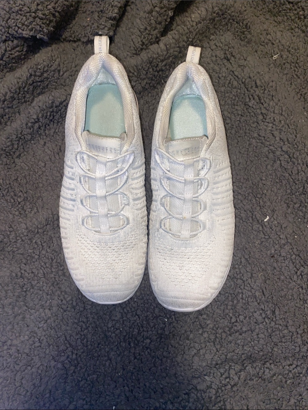 Skechers Women’s White and Silver Slip-On Knit Athletic Sneakers